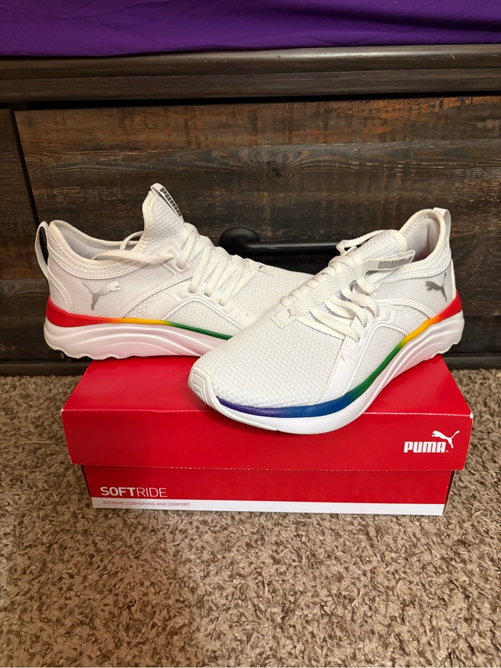 PUMA women’s White SoftRide Sneakers with Rainbow Accent
